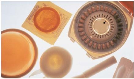 A variety of contraceptive methods. (Reproduced by permission of The Stock Market.)