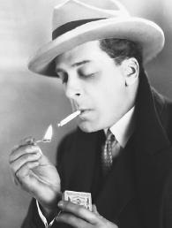 ACTOR JACK BUCHANAN LIT THIS MATCH USING A SIMPLE DISPLAY OF FRICTION: DRAGGING THE MATCH AGAINST THE BACK OF THE MATCHBOX. (Photograph by Hulton-Deutsch Collection/Corbis. Reproduced by permission.)