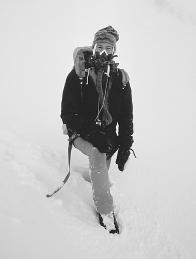 THE AIR PRESSURE ON TOP OF MOUNT EVEREST, THE WORLD'S TALLEST PEAK, IS VERY LOW, MAKING BREATHING DIFFICULT. MOST CLIMBERS WHO ATTEMPT TO SCALE EVEREST THUS CARRY OXYGEN TANKS WITH THEM. SHOWN HERE IS JIM WHITTAKER, THE FIRST AMERICAN TO CLIMB EVEREST. (Photograph by Galen Rowell/Corbis. Reproduced by permission.)