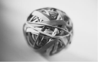 RUBBER BANDS, LIKE THE ONES SHOWN HERE FORMED INTO A BALL, ARE A CLASSIC EXAMPLE OF ELASTIC DEFORMATION. (Photograph by  Klein/Corbis. Reproduced by permission.)