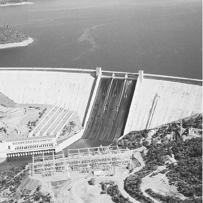 HYDROELECTRIC DAMS, LIKE THE SHASTA DAM IN CALIFORNIA, SUPERBLY ILLUSTRATE THE PRINCIPLE OF ENERGY CONVERSION. (Photograph by Charles E. Rotkin/Corbis. Reproduced by permission.)