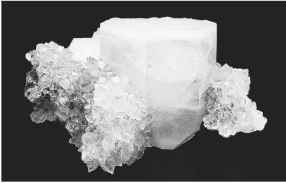CALCITE WITH QUARTZ. (© Mark A. Schneider/Photo Researchers. Reproduced by permission.)