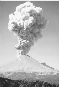 THE POPOCATEPETL VOLCANO ERUPTS, SPEWING ASH, ROCKS, AND GASES. (&#xA9; Wesley Bocxe/Photo Researchers. Reproduced by permission.)