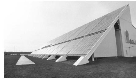 A building sided with photo-voltaic cells, which capture the energy of the Sun and convert it into electrical energy. (Reproduced courtesy of the Library of Congress.)