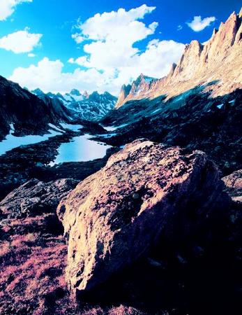 Titcomb Basin, Wyoming. A basin is an area of relatively flat-lying ground surrounded by higher terrain. PHOTOGRAPH REPRODUCED BY PERMISSION OF THE CORBIS CORPORATION.