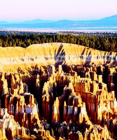In Bryce Canyon, erosion has shaped colorful layers of limestone, sandstone, and mudstone into thousands of spires, fins, pinnacles, and mazes that are collectively called hoodoos. PHOTOGRAPH REPRODUCED BY PERMISSION OF CORBIS CORPORATION.