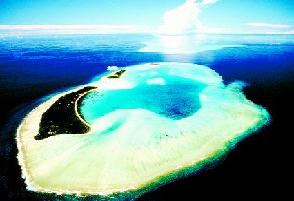 Like other atolls, Kayangel atoll in the western Pacific Ocean is a ring-shaped coral reef that encloses a deep lagoon. Atolls are common in the Indian and Pacific oceans. PHOTOGRAPH REPRODUCED BY PERMISSION OF PHOTO RESEARCHERS.