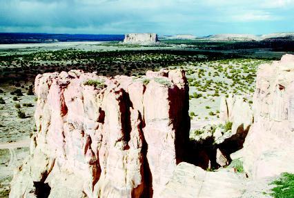 The Enchanted Mesa, in Acoma Pueblo, New Mexico, rises 430 feet from the desert valley. PHOTOGRAPH REPRODUCED BY PERMISSION OF THE CORBIS CORPORATION.