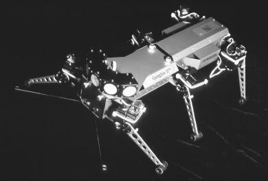 The six-legged insectlike robot known as Genghis is programmed to home in on objects by tracking the heat they give off.