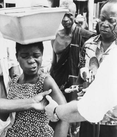 A Nigerian woman receives a smallpox vaccination in 1969 during the World Health Organizations effort to wipe out smallpox. By 1979 the virus had been eradicated.