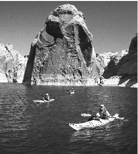 Lake Powell was formed with the construction of the Glen Canyon Dam. Such lakes offer recreational activities such as kayaking.