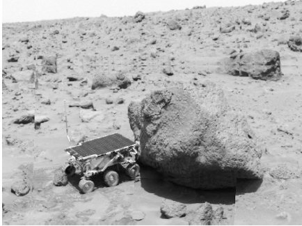 Sojourner rolls across the Martian surface. The Pathfinder mission proved to be one of the most successful in history.