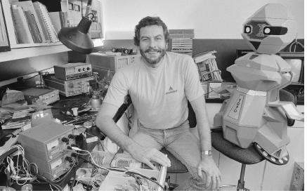 Atari cofounder Nolan Bushnell sits in his workshop. Atari introduced the first programmable home video game system in 1977.