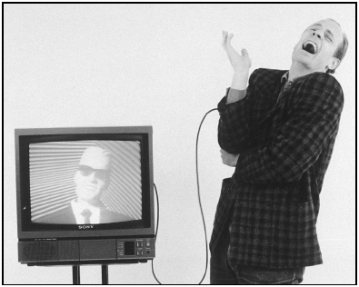 Actor Matt Frewers actions are translated onscreen into those of his avatar, talk show host Max Headroom. Max was the first virtual celebrity.